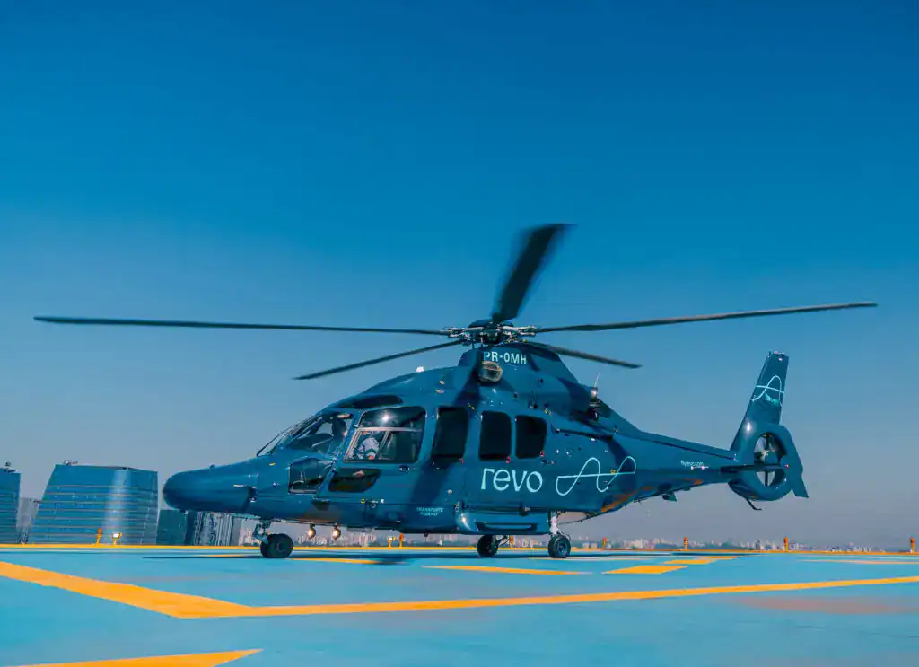 grey helicopter in blue background