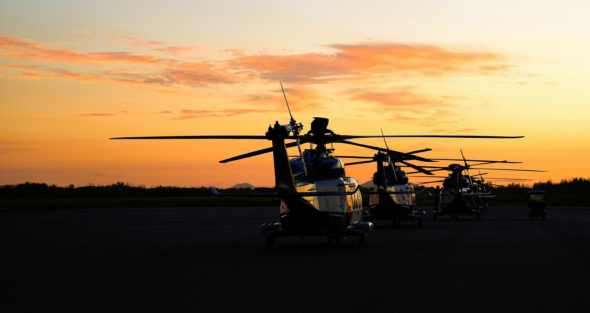 Helicopters on sunset