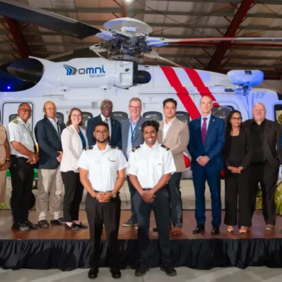 crew standing in front of helicopter