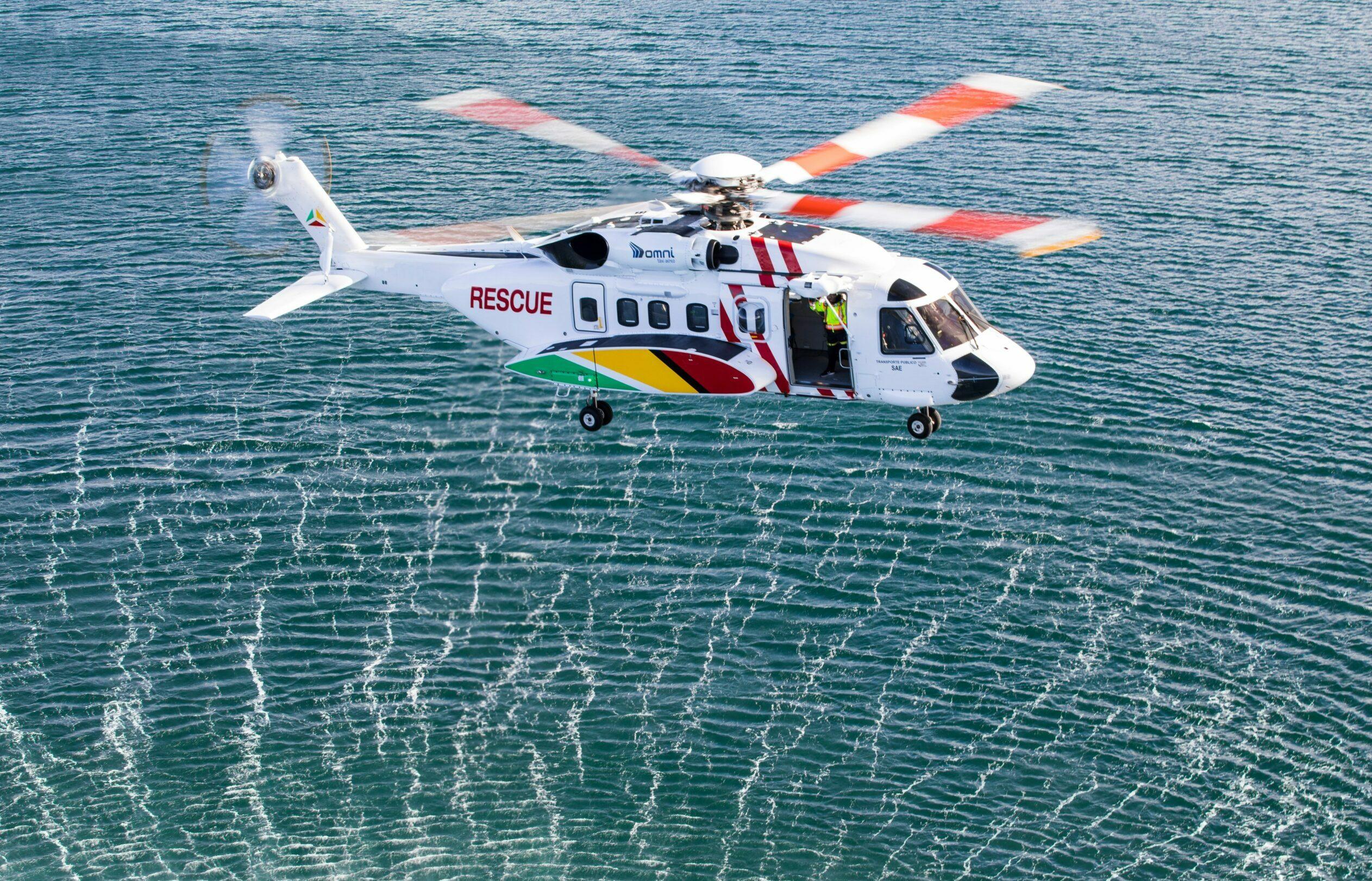 image of an omni helicopter over water